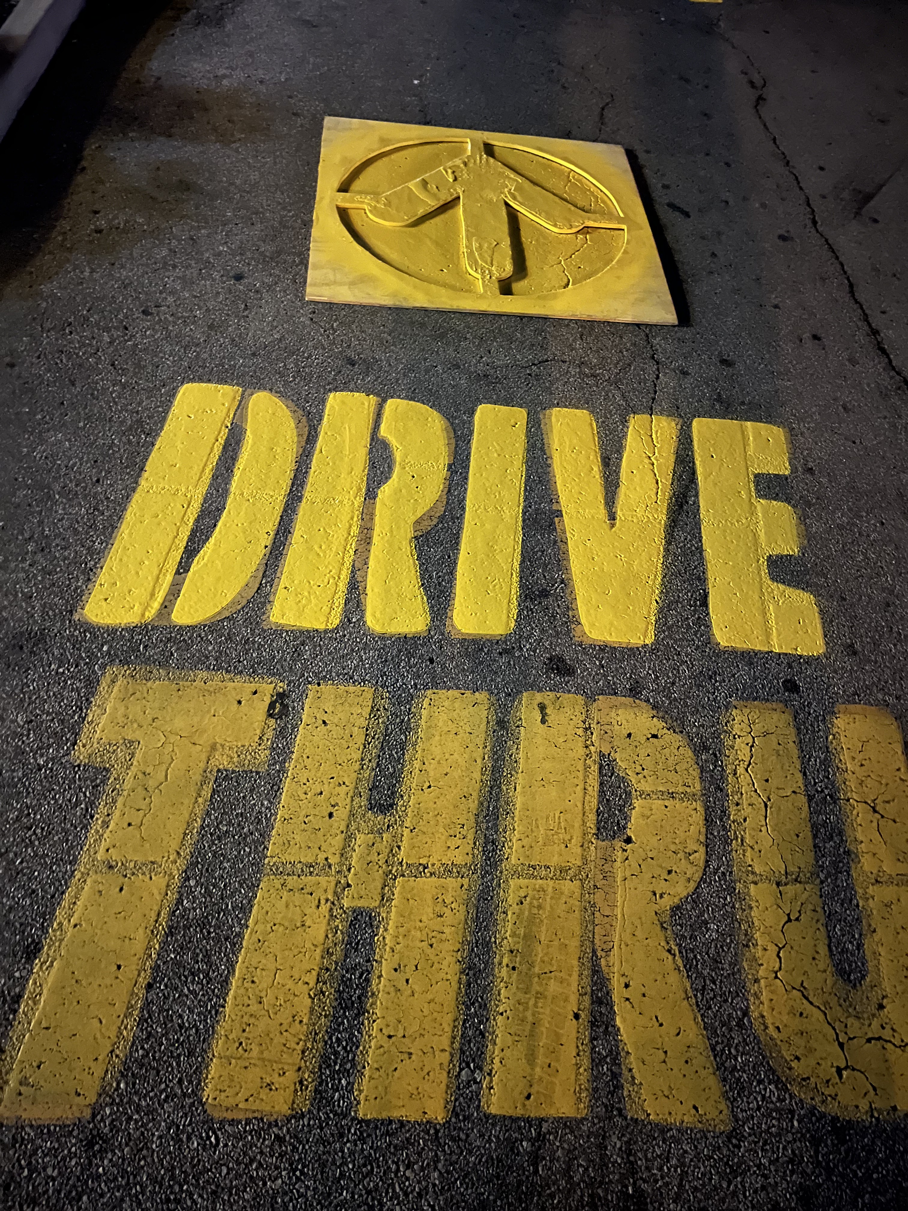 Drive thru pavement marking on asphalt
